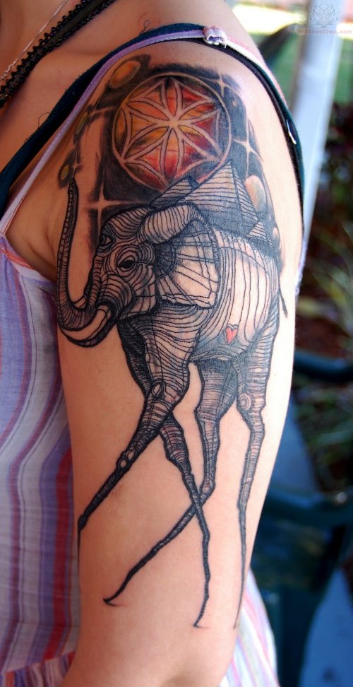 Grey Ink Dali Elephant Tattoo On Girl Shoulder